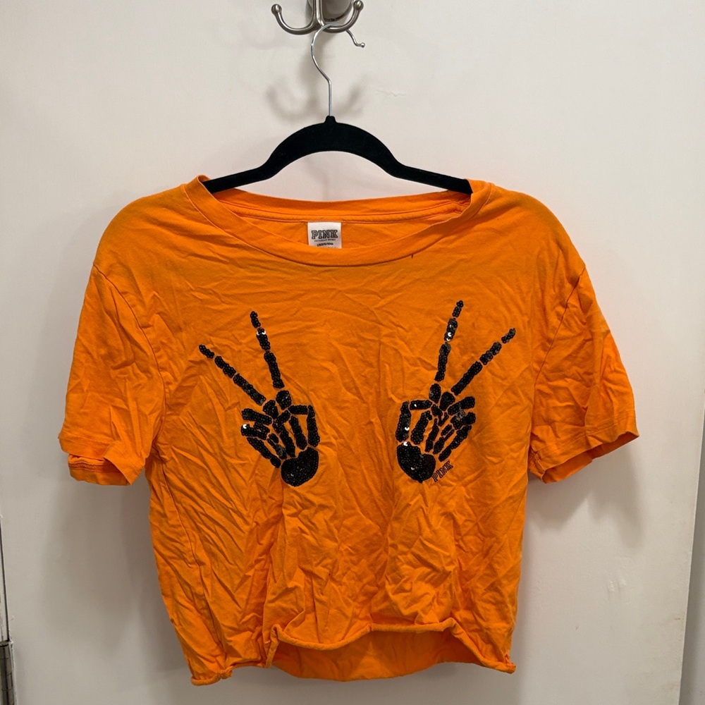PINK Victoria's Secret Orange Tee with Skeleton Peace Graphic